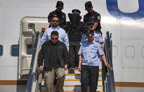 U.S. repatriates wanted suspect to China