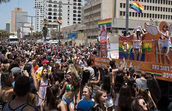 People take part in Tel Aviv Pride Parade in Israel