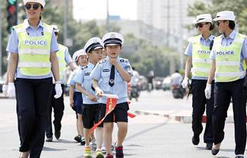 Pupils learn knowledge from traffic police in N China's Hebei