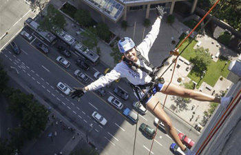 People participate in "Rope For Hope" fund raising event in Vancouver