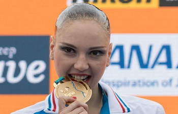 Kolesnichenko wins women solo technical final of synchronized swimming