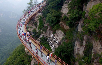 Scenery of plank road on cliff of Shaohua Mountain in NW China