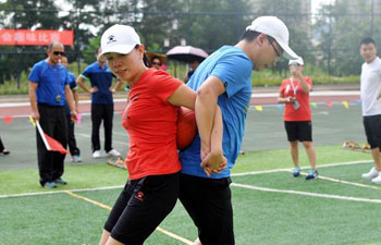 People participate in fun sports games in China's Guizhou