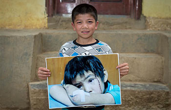 Pic story: life of "Big-eyed Boy" after Ludian earthquake in SW China