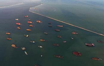 Ships anchored at port to take shelter from wind
