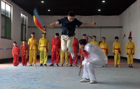 Students learn martial arts during summer vocation in China