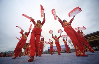 People take part in square dance competition in C China's Hunan