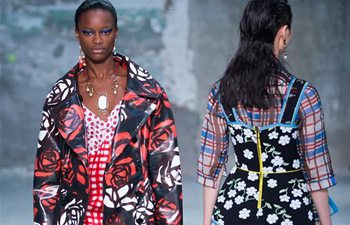 Models walk runway for fashion house Marni in Milan