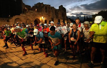 35th Ultra- Marathon race Spartathlon starts under Acropolis hill in Athens