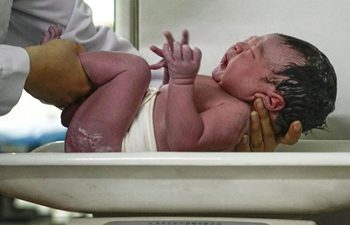 In pics: first newborn baby at China's Anxin county hospital on National Day