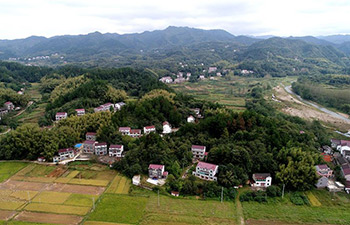 Township scenery at foot of E China's Dabie Mountains