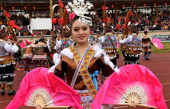 Miao people mark Lusheng and horse fighting festival in Guangxi
