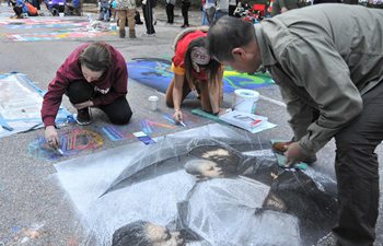 Over 200 worldwide artists make street painting in Houston