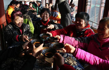 People enjoy leisure time at teahouse in China's Anhui