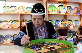 In pics: Dong ethnic painting in south China's Guangxi