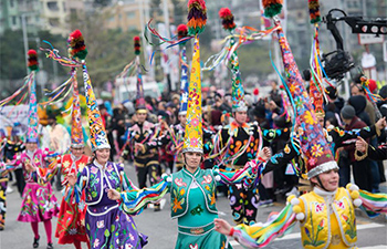 Macao holds int'l parade to mark 18th anniversary of return to motherland
