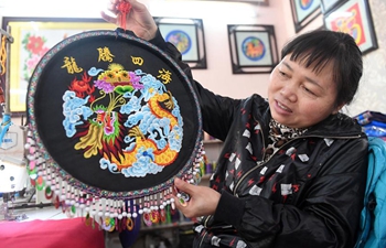 Intangible cultural heritage: colored embroidery of Zhuang ethnic group
