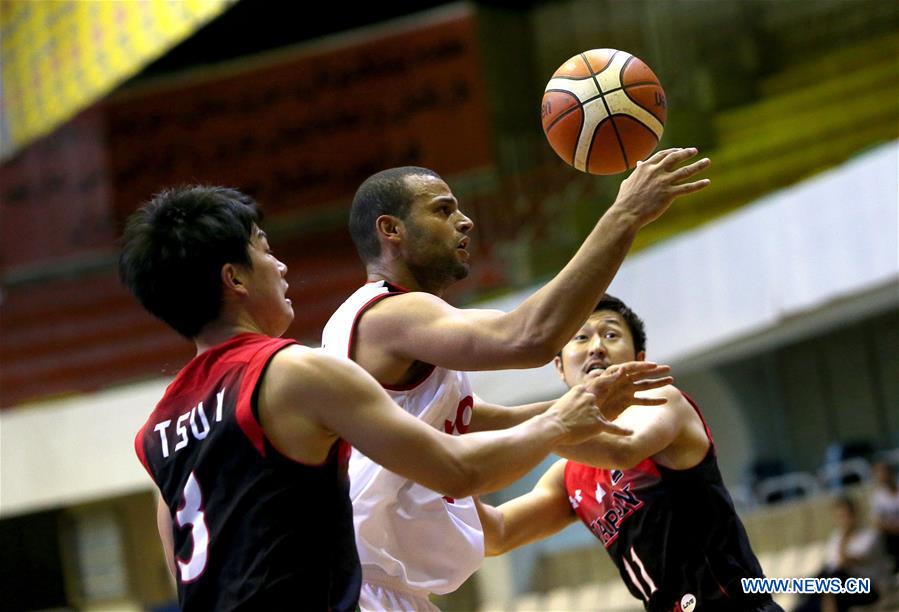 Mousa Al-Awadi (C) of Jordan competes during the match against Japan at the 2016 FIBA Asia Challenge in Tehran, Iran, Sept. 16, 2016. Jordan won 87-80 and advanced to the semi-final.