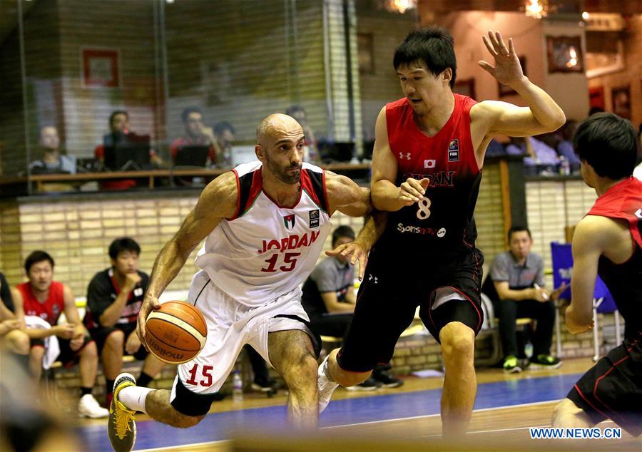 Abbas Zaid (L) of Jordan competes during the match against Japan at the 2016 FIBA Asia Challenge in Tehran, Iran, Sept. 16, 2016. Jordan won 87-80 and advanced to the semi-final.