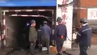 2 dead, 13 trapped in flooded coal mine in NE China