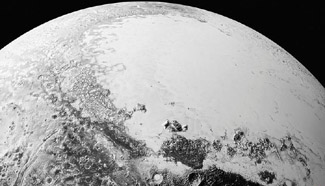 NASA releases new photos of Pluto