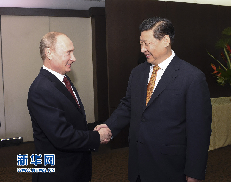 7月14日，国家主席习近平在巴西福塔莱萨会见俄罗斯总统普京。新华社记者李学仁摄