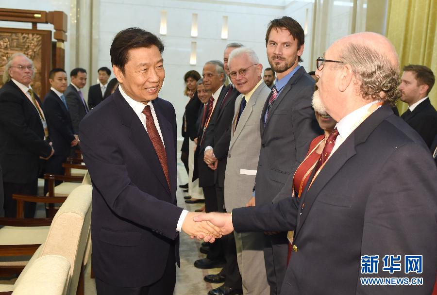 9月4日，国家副主席李源潮在北京会见“2014中国共产党与世界对话会”代表。 新华社记者 马占成 摄