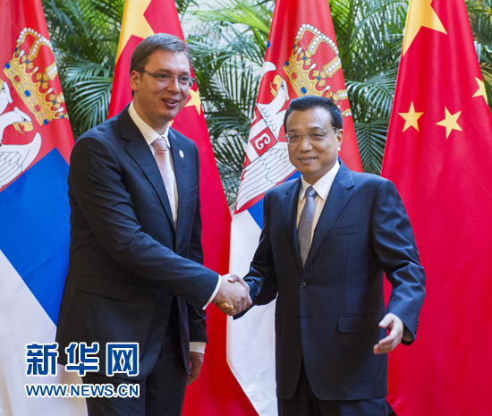 9月10日，中国国务院总理李克强在天津会见来华出席2014年夏季达沃斯论坛年会的塞尔维亚总理武契奇。 新华社记者王晔摄