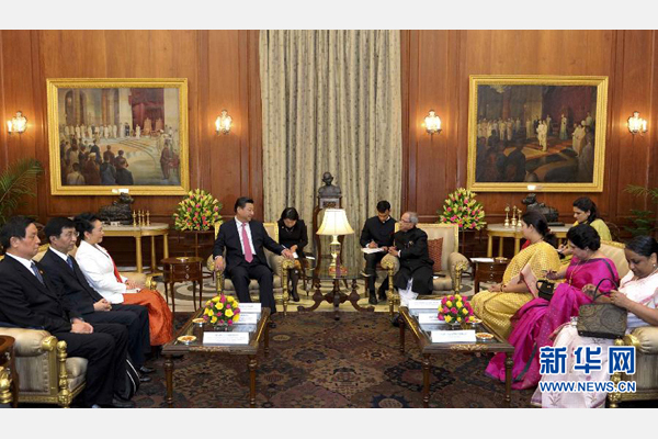 9月18日，国家主席习近平在新德里会见印度总统慕克吉。 新华社记者张铎 摄