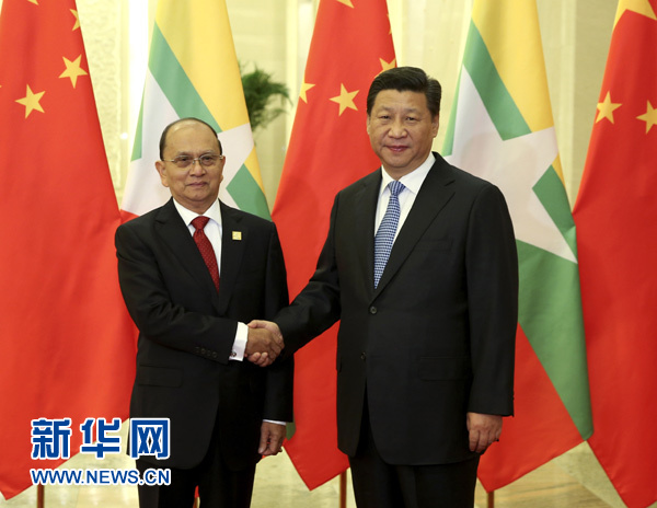 11月8日，中国国家主席习近平在北京人民大会堂会见缅甸总统吴登盛。新华社记者 庞兴雷 摄