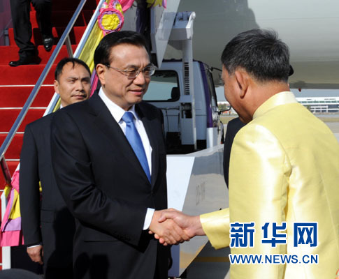 12月19日，中国国务院总理李克强抵达曼谷，出席大湄公河次区域经济合作领导人第五次会议。新华社记者饶爱民摄
