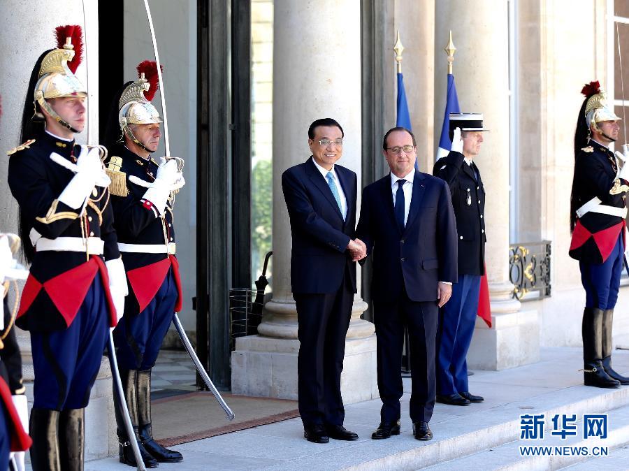 当地时间6月30日下午，中国国务院总理李克强在巴黎爱丽舍宫会见法国总统奥朗德。 新华社记者马占成摄 