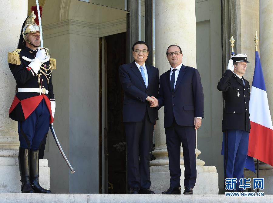 当地时间6月30日下午，国务院总理李克强在巴黎爱丽舍宫会见法国总统奥朗德。 新华社记者李学仁摄