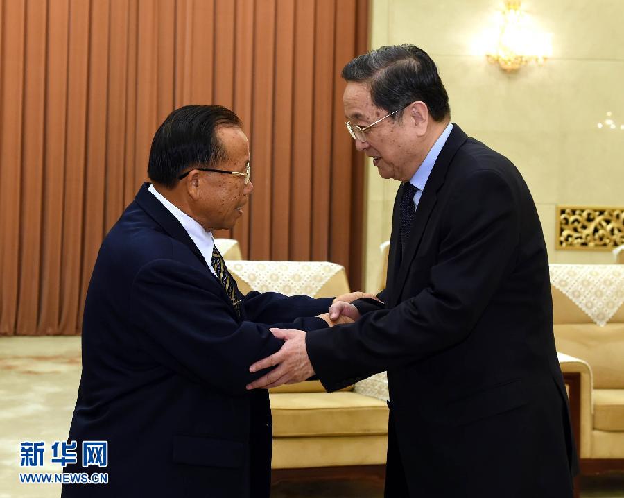  7月1日，全国政协主席俞正声在北京会见老挝建国阵线中央常务副主席董叶陶。 新华社记者 饶爱民 摄