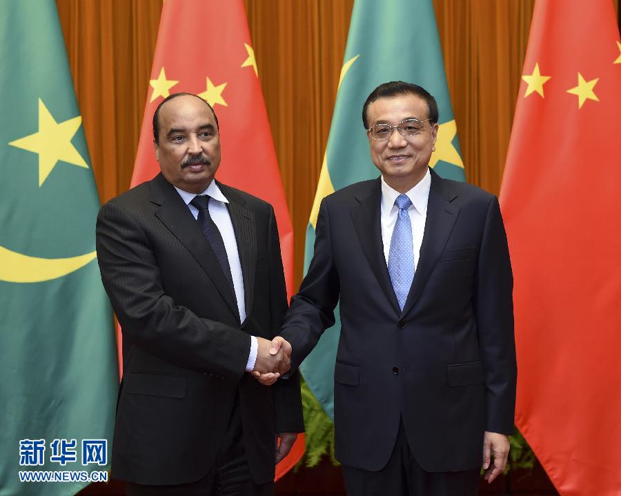 9月15日，国务院总理李克强在北京人民大会堂会见来华进行国事访问的毛里塔尼亚总统阿齐兹。 新华社记者 张铎 摄 