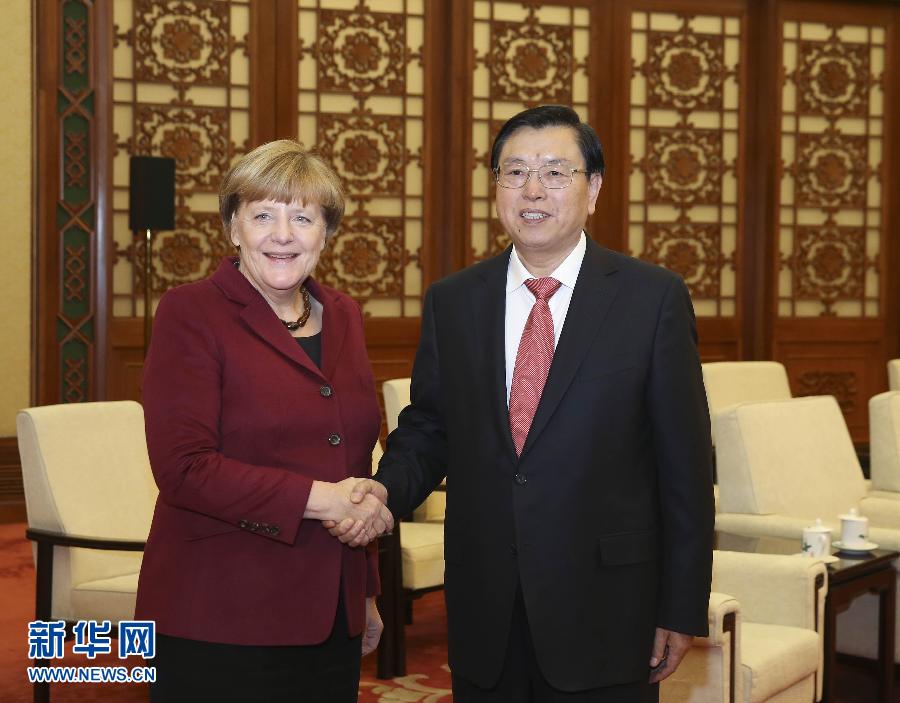 10月29日，全国人大常委会委员长张德江在北京人民大会堂会见德国总理默克尔。 新华社记者 丁林 摄 