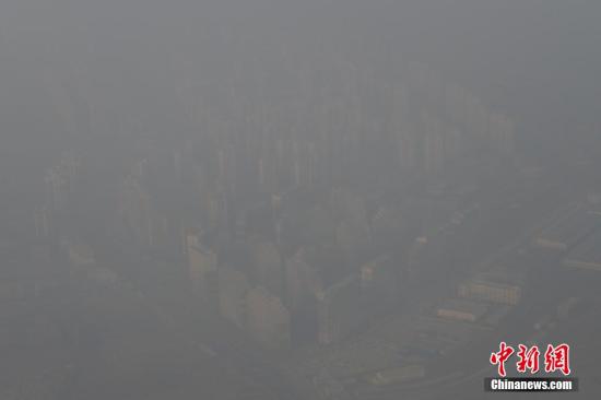 北京今日24时解除空气重污染红色预警 中小学等复课