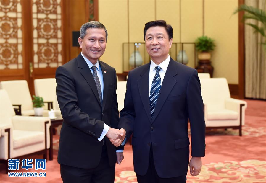 2月29日,中国国家副主席李源潮在北京会见新加坡外长维文.
