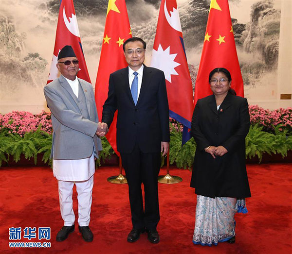3月21日，国务院总理李克强在北京人民大会堂同来华进行正式访问并将出席博鳌亚洲论坛2016年年会的尼泊尔总理奥利举行会谈。 新华社记者庞兴雷 摄