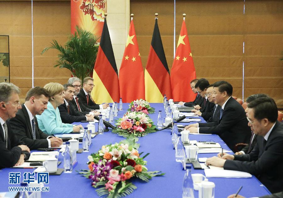 6月13日，国家主席习近平在北京会见德国总理默克尔。 新华社记者刘卫兵 摄 