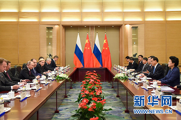 6月25日，国务院总理李克强在北京人民大会堂会见俄罗斯总统普京。新华社记者 李学仁 摄
