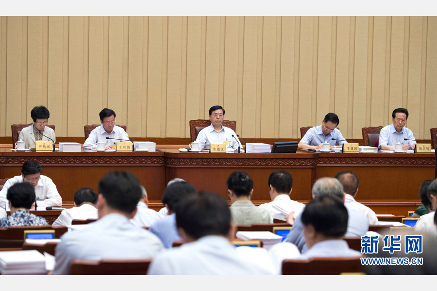  6月29日，十二届全国人大常委会第二十一次会议在北京人民大会堂举行第二次全体会议。张德江委员长出席。 新华社记者谢环驰摄 