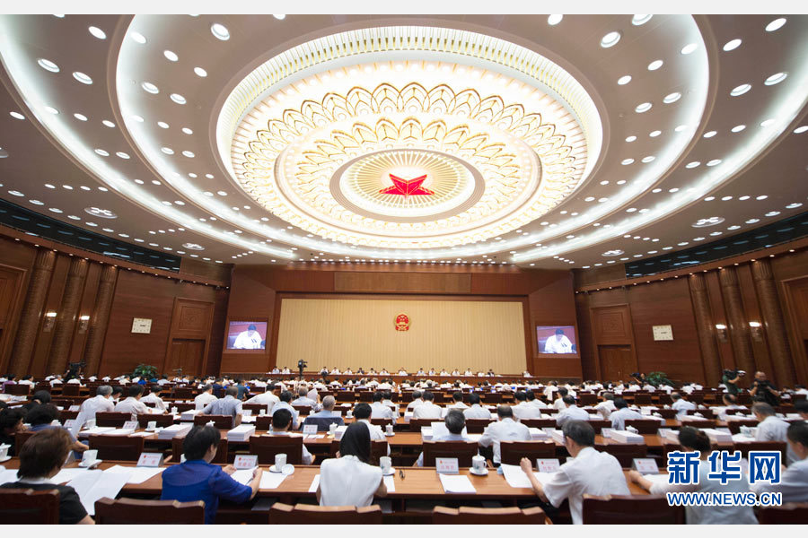  6月29日，十二届全国人大常委会第二十一次会议在北京人民大会堂举行第二次全体会议。张德江委员长出席。 新华社记者谢环驰摄 