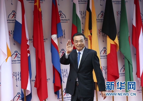  7月15日，中国国务院总理李克强在乌兰巴托出席第十一届亚欧首脑会议。 新华社记者 庞兴雷 摄
