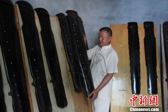 汉源湖畔的斫琴师：打磨历史的遗音