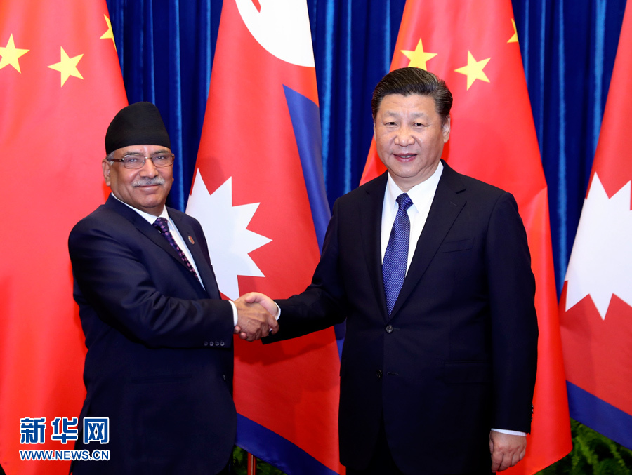 3月27日，国家主席习近平在北京人民大会堂会见尼泊尔总理普拉昌达。 新华社记者 丁林 摄