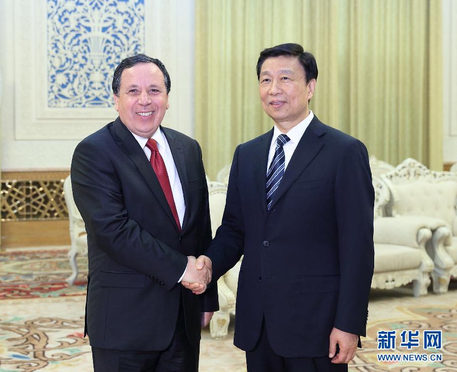 7月20日，国家副主席李源潮在北京会见突尼斯外长杰希纳维。新华社记者王晔摄