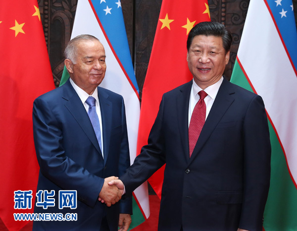 5月20日，國家主席習近平在上海會見烏茲別克斯坦總統卡裏莫夫。“抓住共建絲綢之路經濟帶機遇、擴大多領域合作”