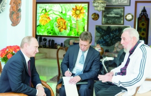 　　古巴前领导人菲德尔·卡斯特罗（右）会见俄罗斯总统普京。 新华社发