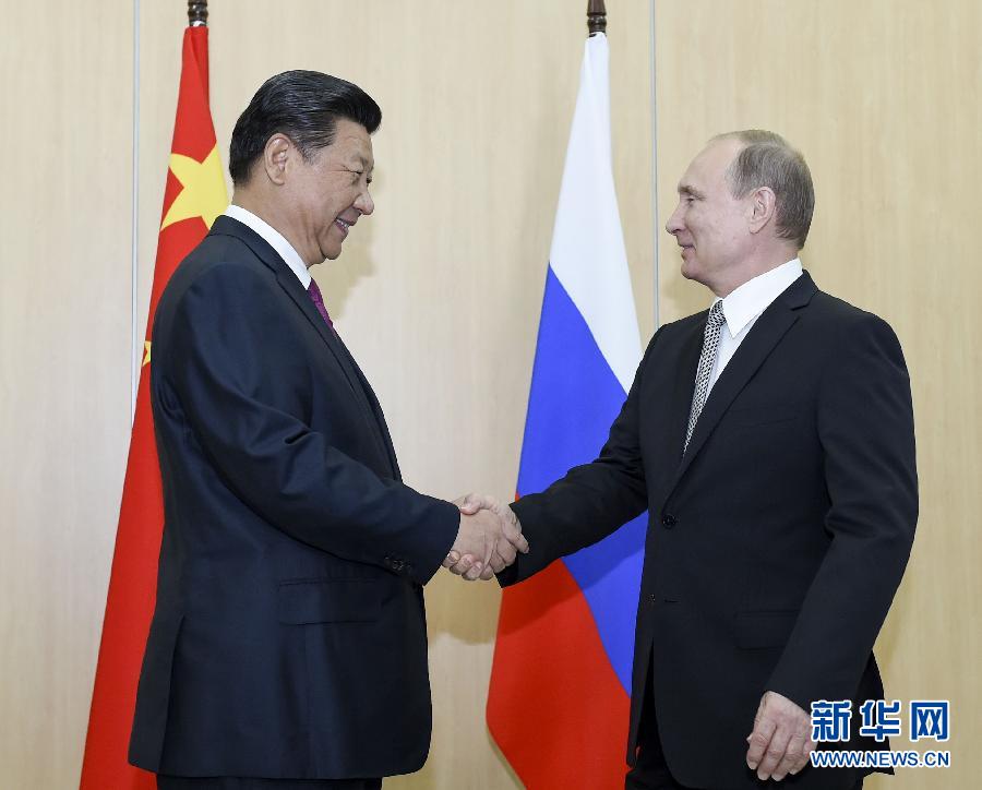 7月8日，国家主席习近平在俄罗斯乌法会见俄罗斯总统普京。新华社记者李学仁摄 
